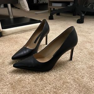 pointed black heels